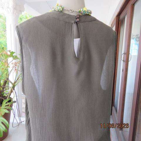 Olive green sleeveless ankle-length high neck top with cross-over front in size 38-40