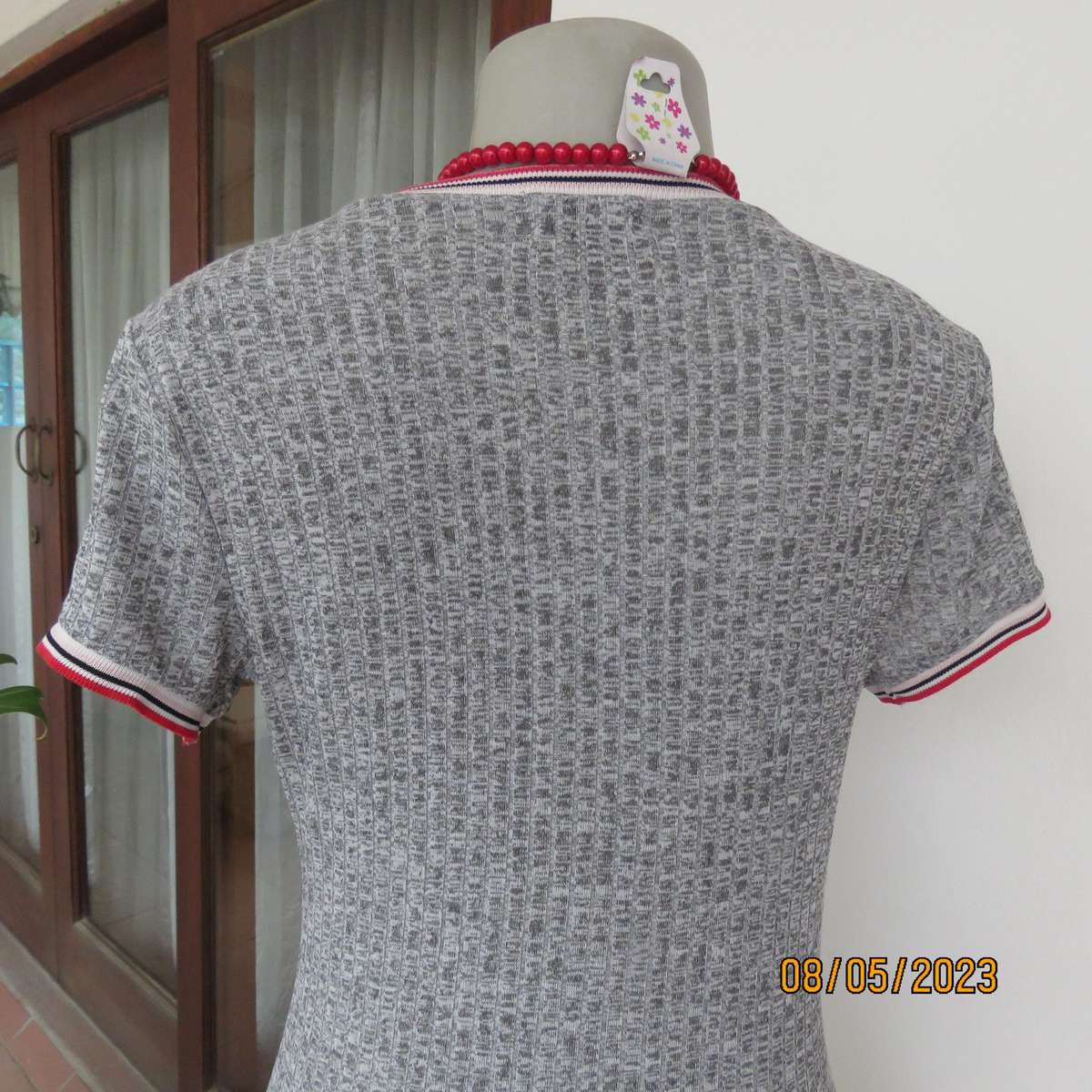 Grey and white mottled polyester stretch knit bodyshirt size 32-34