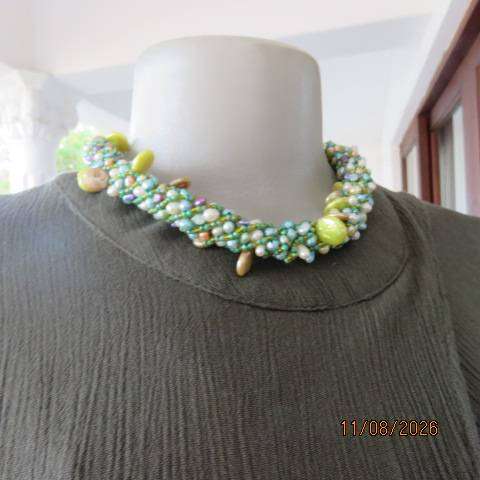 Olive green sleeveless ankle-length high neck top with cross-over front in size 38-40