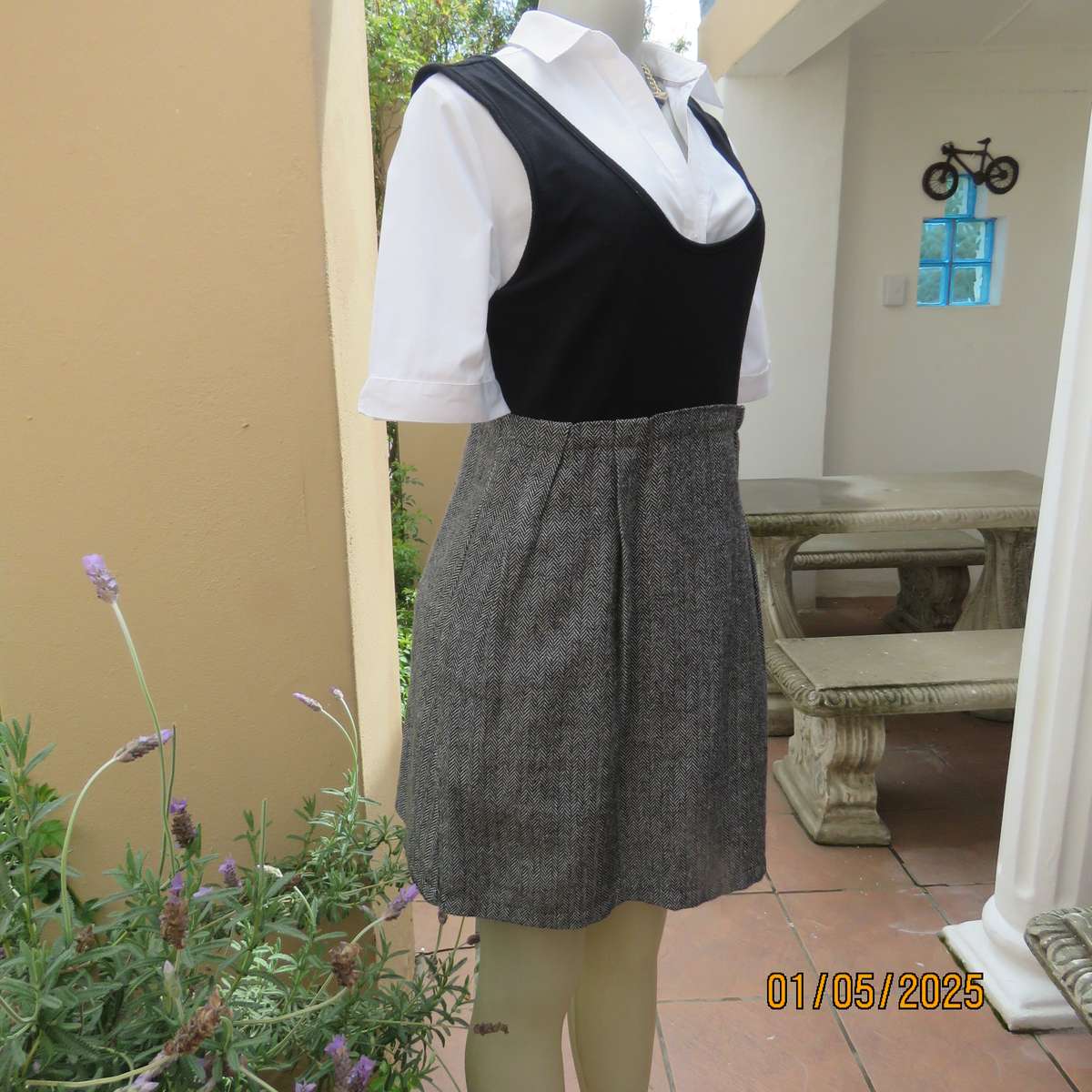 Pinafore with black stretch polyester top-black and white striped woolen bottom .Size 36.
