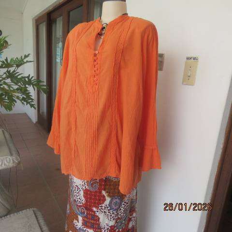 WOOLWORTHS neon orange slightly creased long sleeve slip over cotton top. Size 48