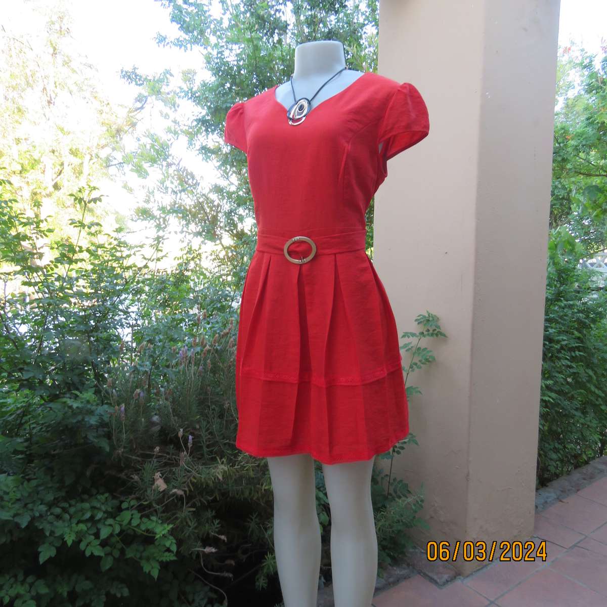 MIGEER poly-rayon red fully lined dress. Size 36. Short pleated bottom. V neck top. Capped sleeves