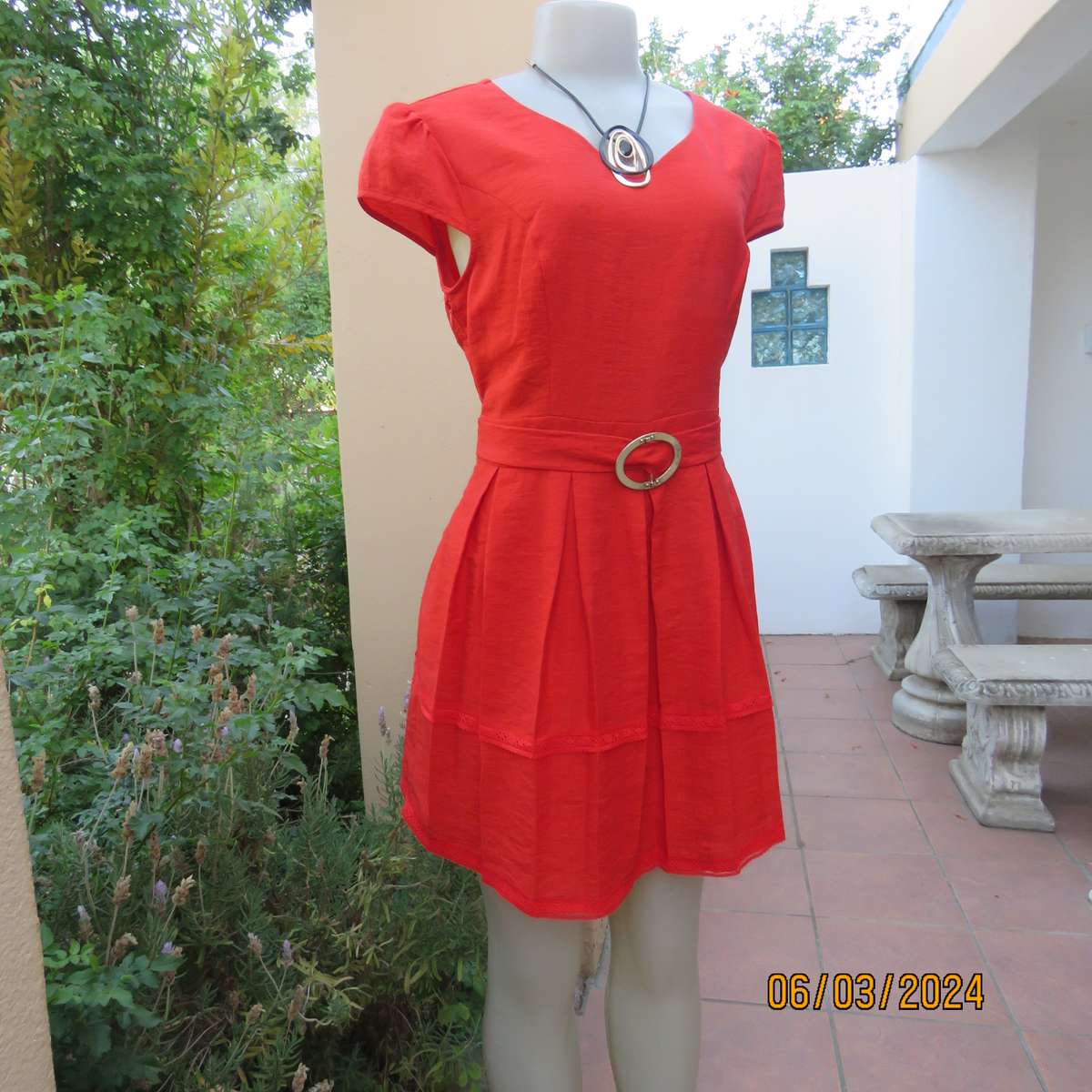 MIGEER poly-rayon red fully lined dress. Size 36. Short pleated bottom. V neck top. Capped sleeves