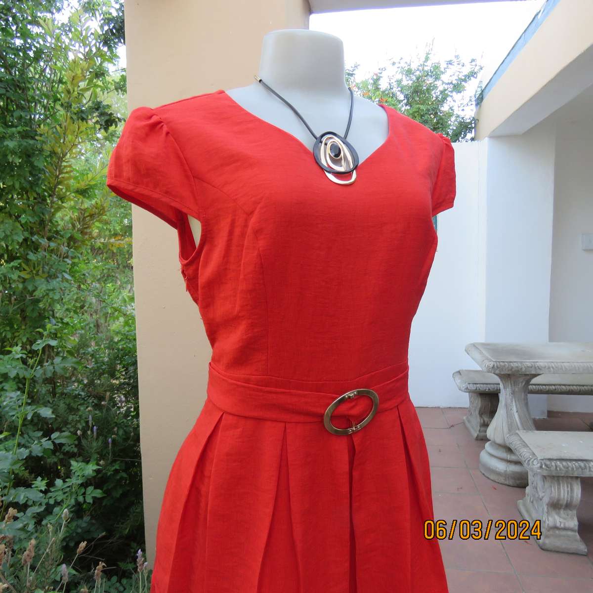 MIGEER poly-rayon red fully lined dress. Size 36. Short pleated bottom. V neck top. Capped sleeves