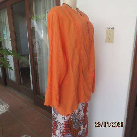 WOOLWORTHS neon orange slightly creased long sleeve slip over cotton top. Size 48