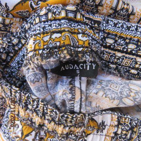 AUDACITY geometric printed wide legged viscose pants in mustard-black-white. Size 32