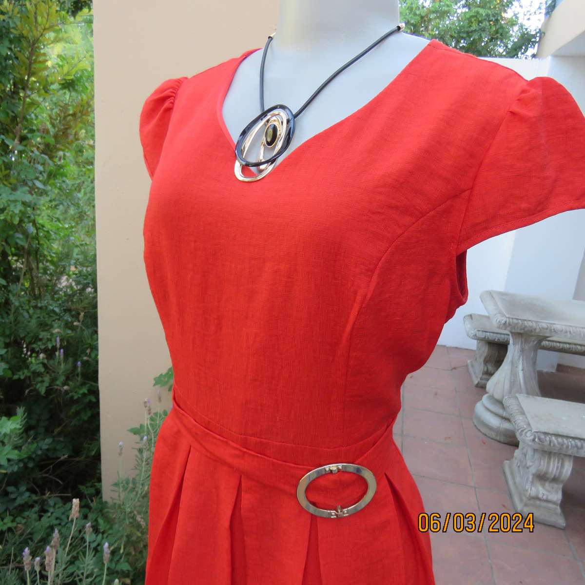 MIGEER poly-rayon red fully lined dress. Size 36. Short pleated bottom. V neck top. Capped sleeves