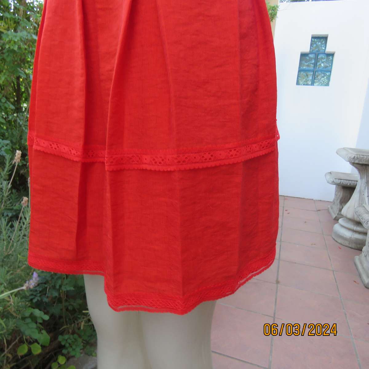 MIGEER poly-rayon red fully lined dress. Size 36. Short pleated bottom. V neck top. Capped sleeves