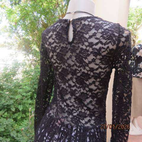 REAL Clothing black stretch polyester lace slip over long sleeve top. Size 32-34