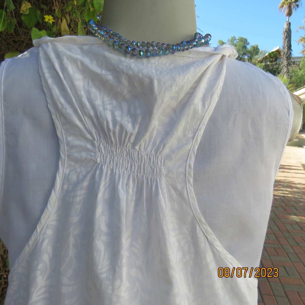 MILADYS white 2 pc floral polycotton sleeveless slip over top. Size 38