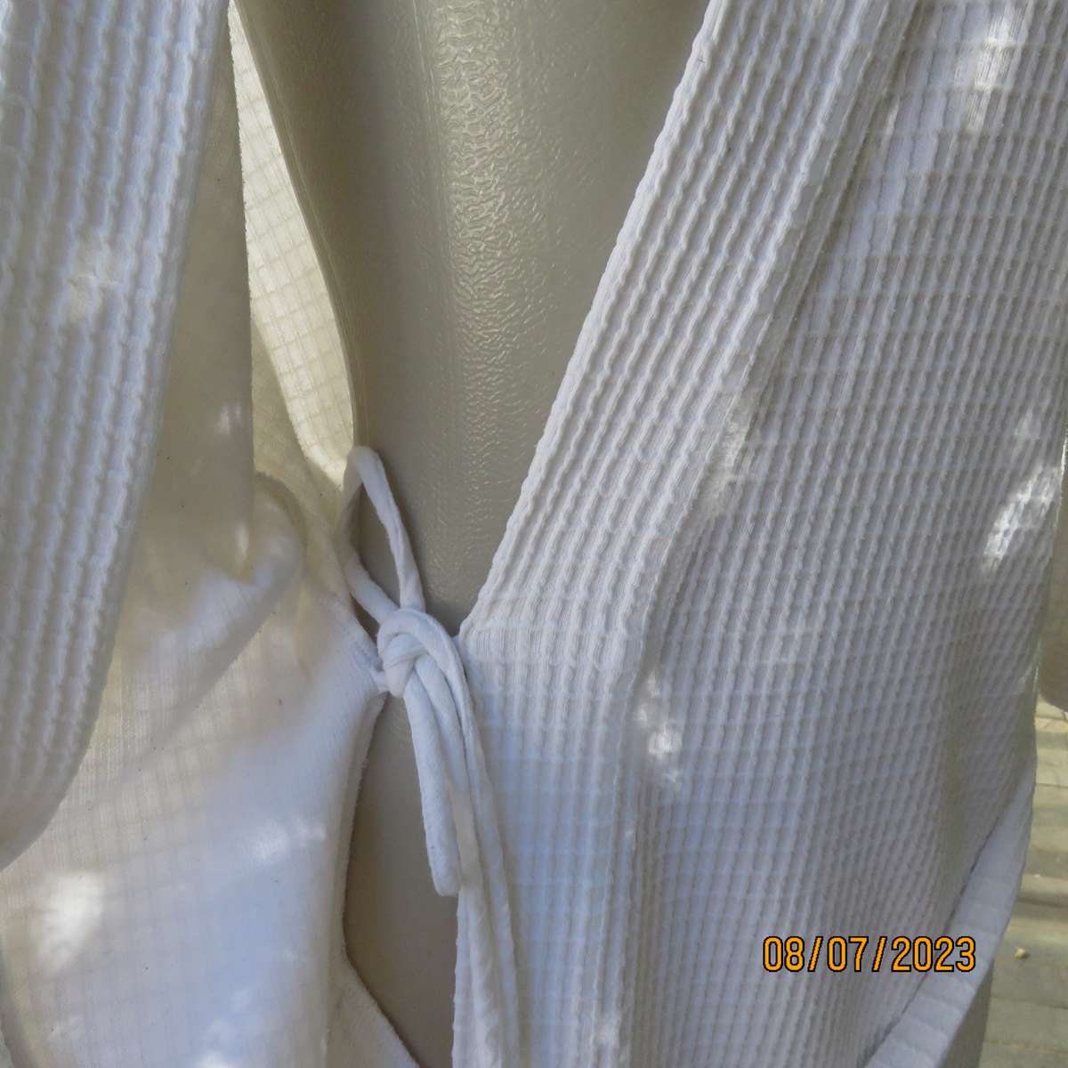 WOOLWORTHS white waffle fold over night gown size 40. With belt.