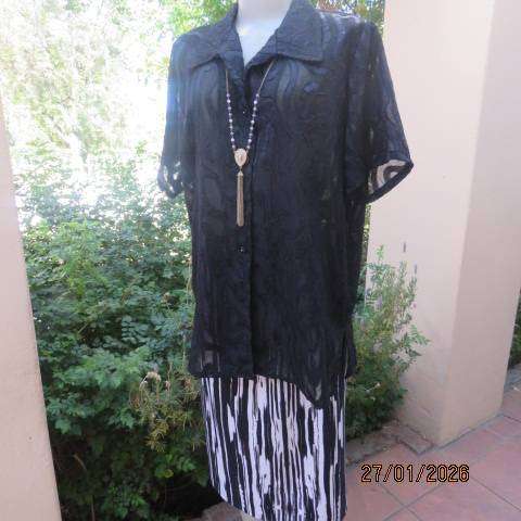 Black opaque embossed sheer polyester button down top with open collar. Size 42.