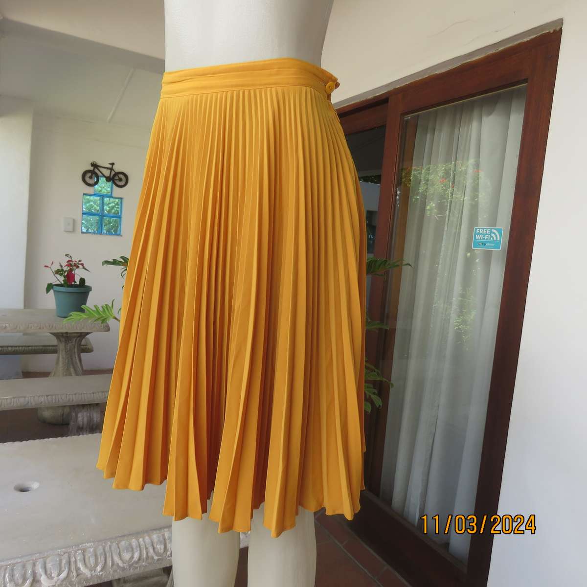 TRUWORTHS mustard colour flare permanent pleated skirt. Size 34.