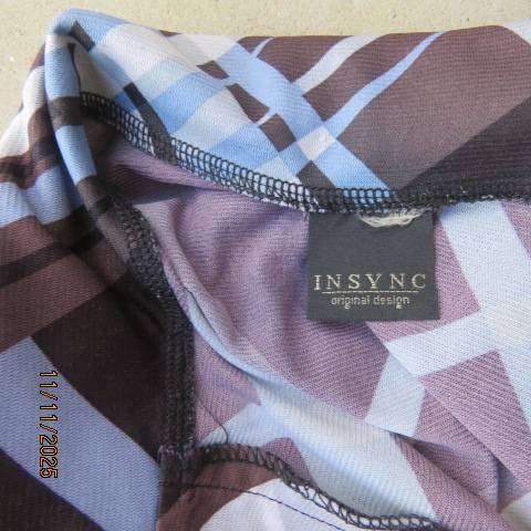 Geometric printed brown-black-cream-blue slip over stretch polyester top size 38-40