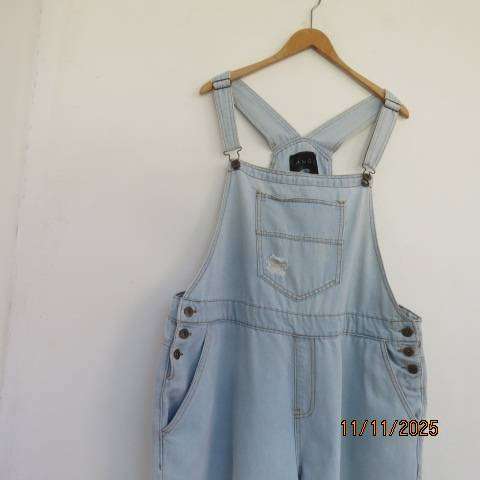 Light blue denim distressed look polycotton jumpsuit size 46.