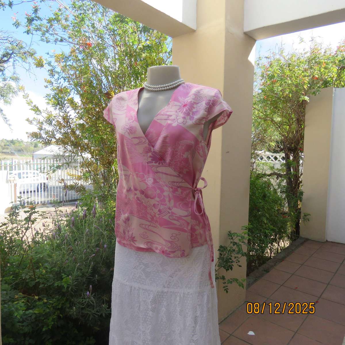Rose pink floral fold over pure silk top. Tiny capped sleeves. Size 34