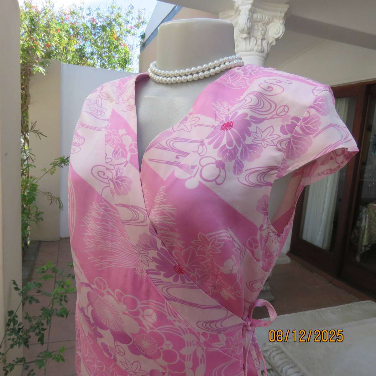 Rose pink floral fold over pure silk top. Tiny capped sleeves. Size 34