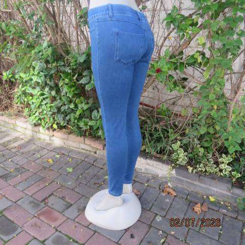 T C M blue denim polycotton stretch jeggings with back pockets, elastic waist, size 34-36