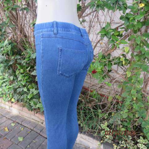T C M blue denim polycotton stretch jeggings with back pockets, elastic waist, size 34-36