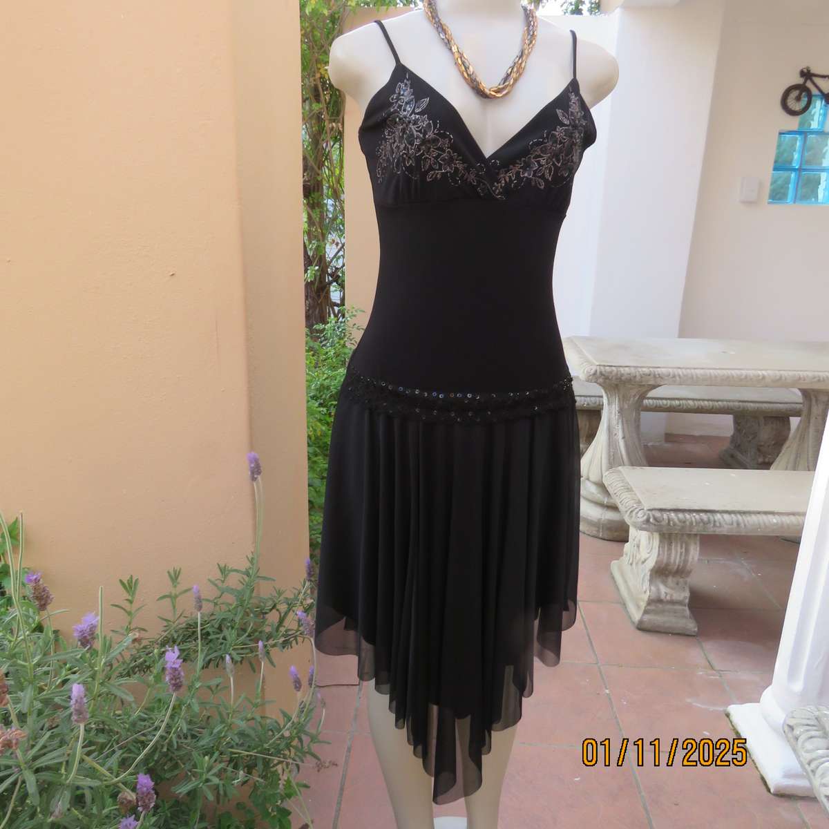 NAPOLI black evening strappy dress in stretch polyester. Richly embellished. Dropped waist.Size 34.