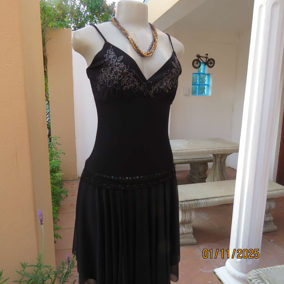 NAPOLI black evening strappy dress in stretch polyester. Richly embellished. Dropped waist.Size 34.