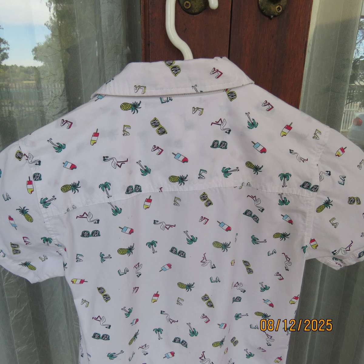 REAL Kids white cotton shirt with colourful patterns. For 9 to 10 year old.