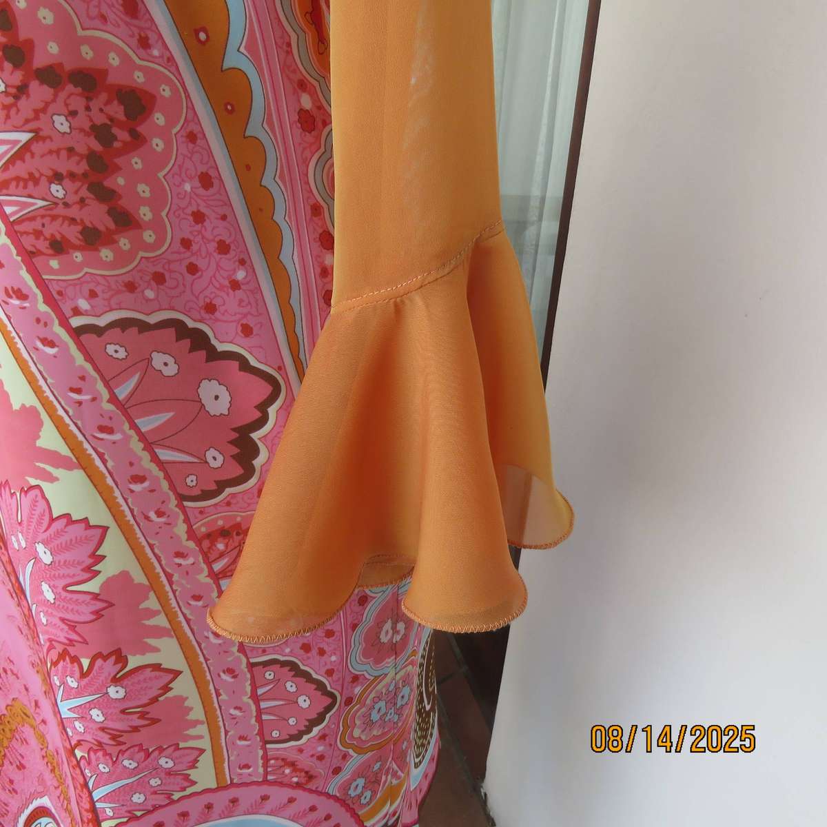 Tangerine boutique made long sleeve shiny polyester bolero. Flare cuffs. Size 34-36