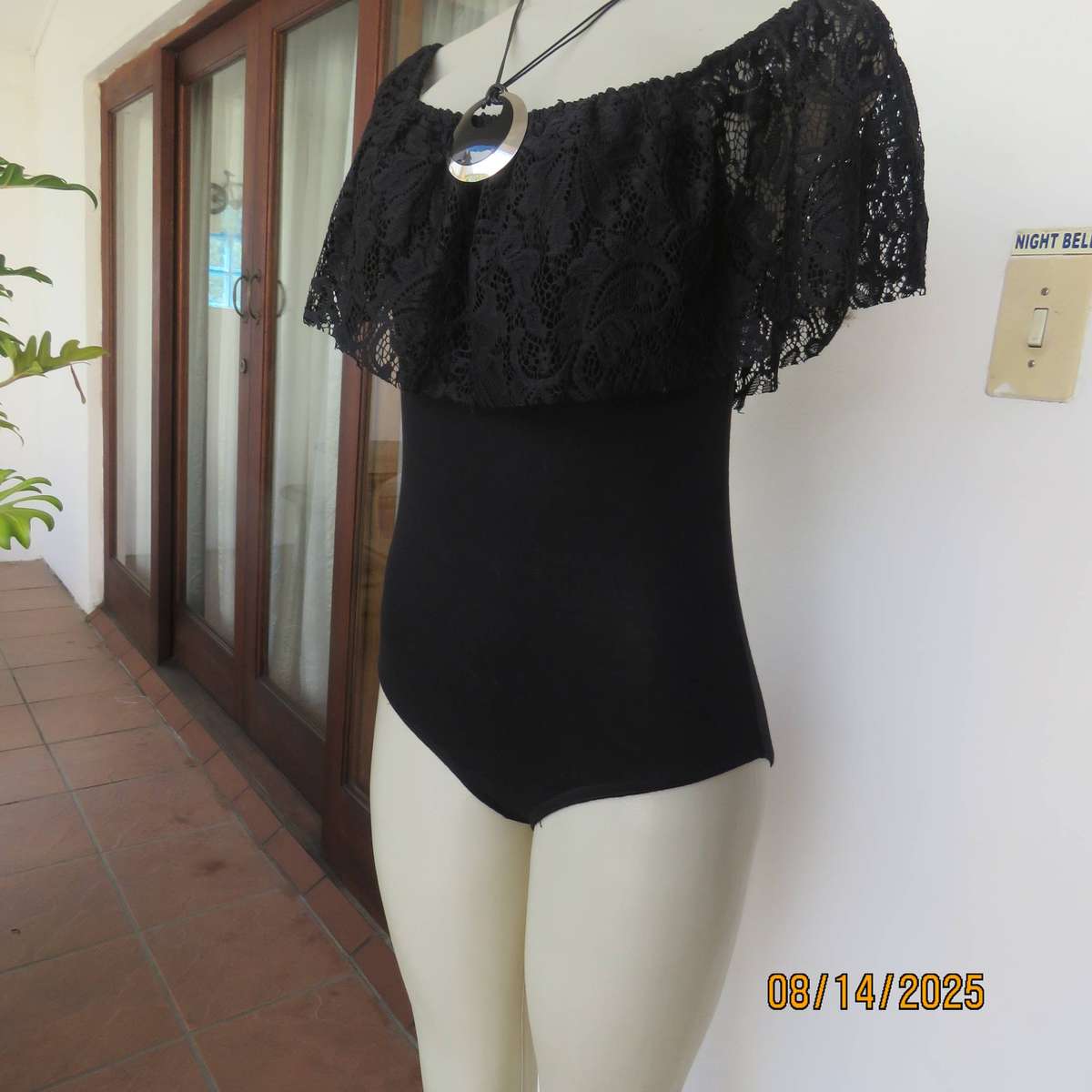 Black stretch viscose body shirt with wide polyester lace collar. Size 36