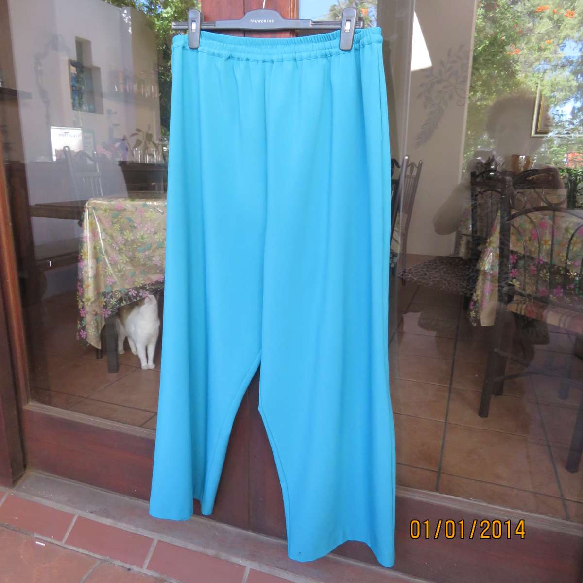 Smart turquoise comfy heavy polyester pants size 46-48. Elasticated waist.