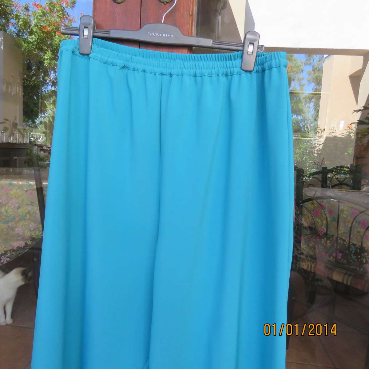 Smart turquoise comfy heavy polyester pants size 46-48. Elasticated waist.