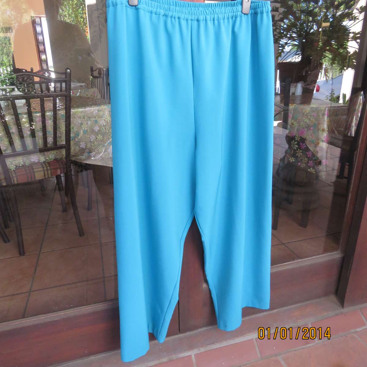 Smart turquoise comfy heavy polyester pants size 46-48. Elasticated waist.