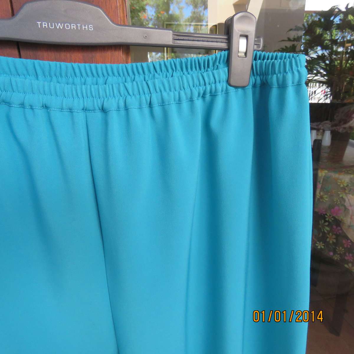 Smart turquoise comfy heavy polyester pants size 46-48. Elasticated waist.