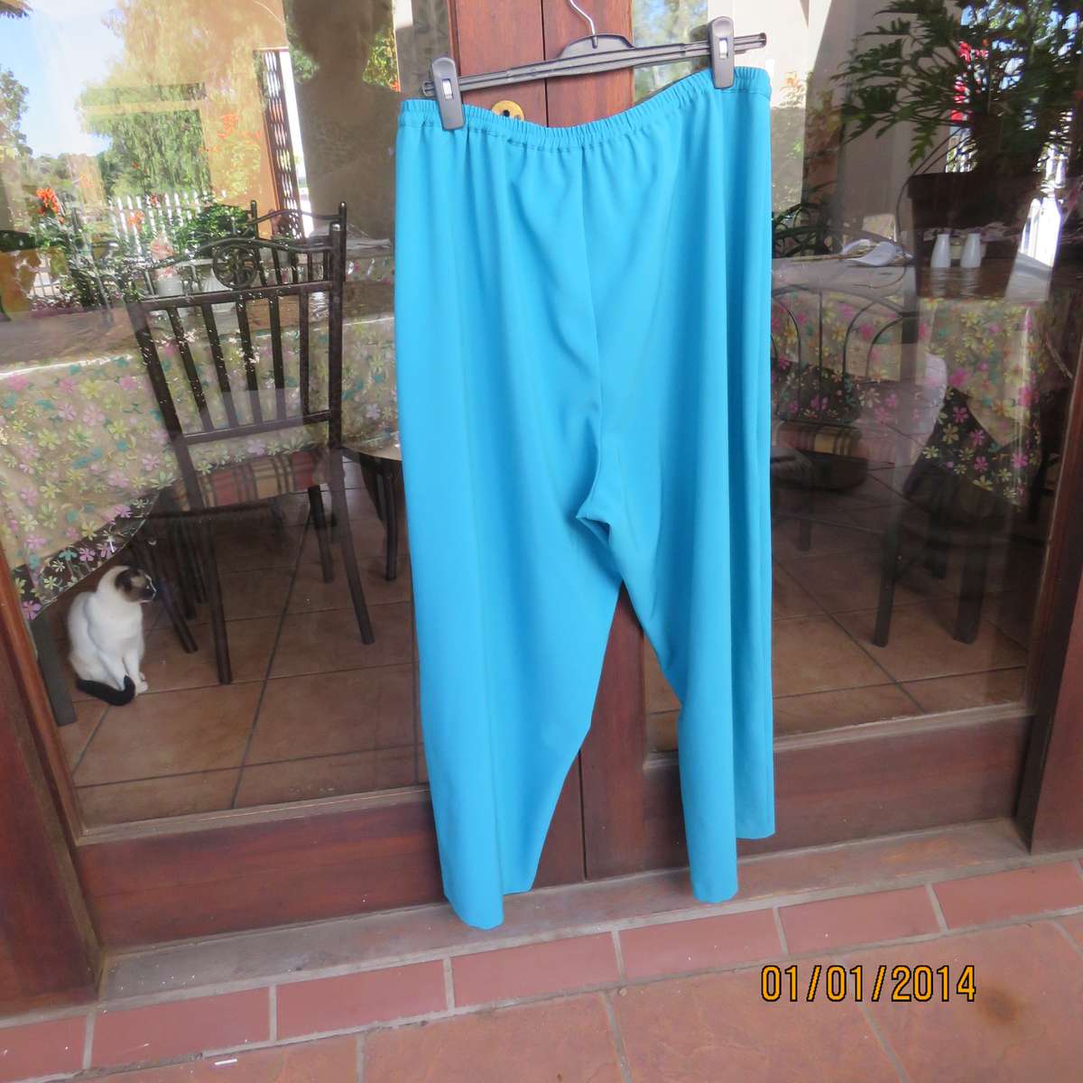 Smart turquoise comfy heavy polyester pants size 46-48. Elasticated waist.