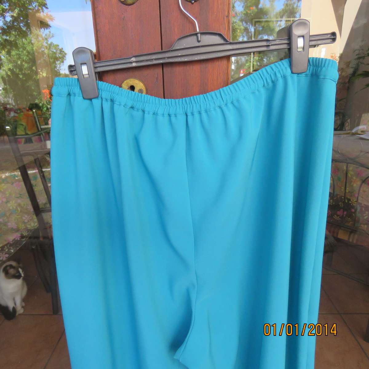 Smart turquoise comfy heavy polyester pants size 46-48. Elasticated waist.