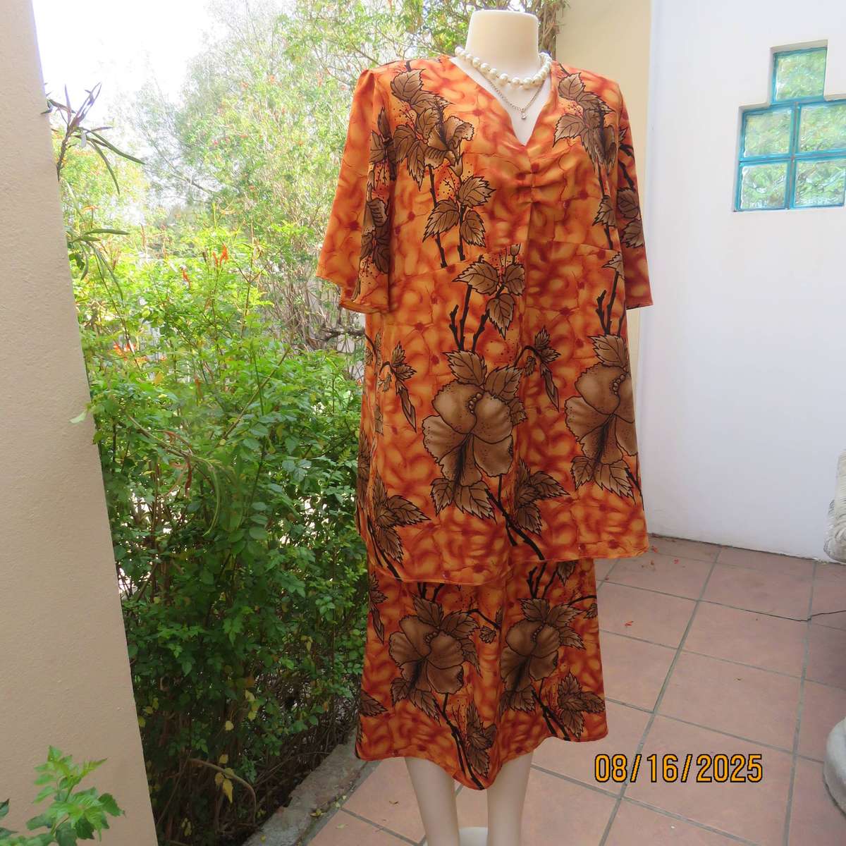 Owner made 2 pc skirt-top outfit in burnt orange and brown. Size 44.