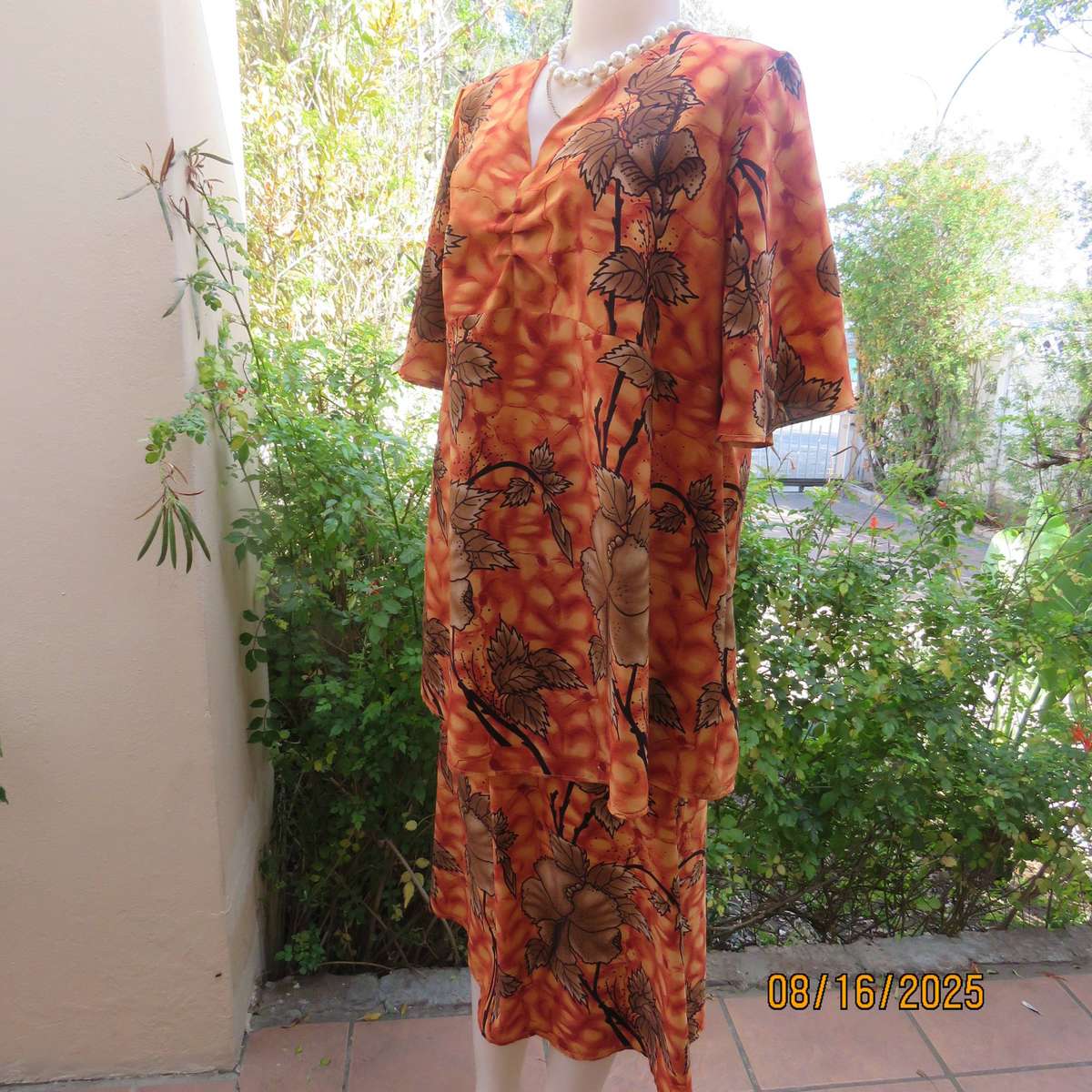 Owner made 2 pc skirt-top outfit in burnt orange and brown. Size 44.