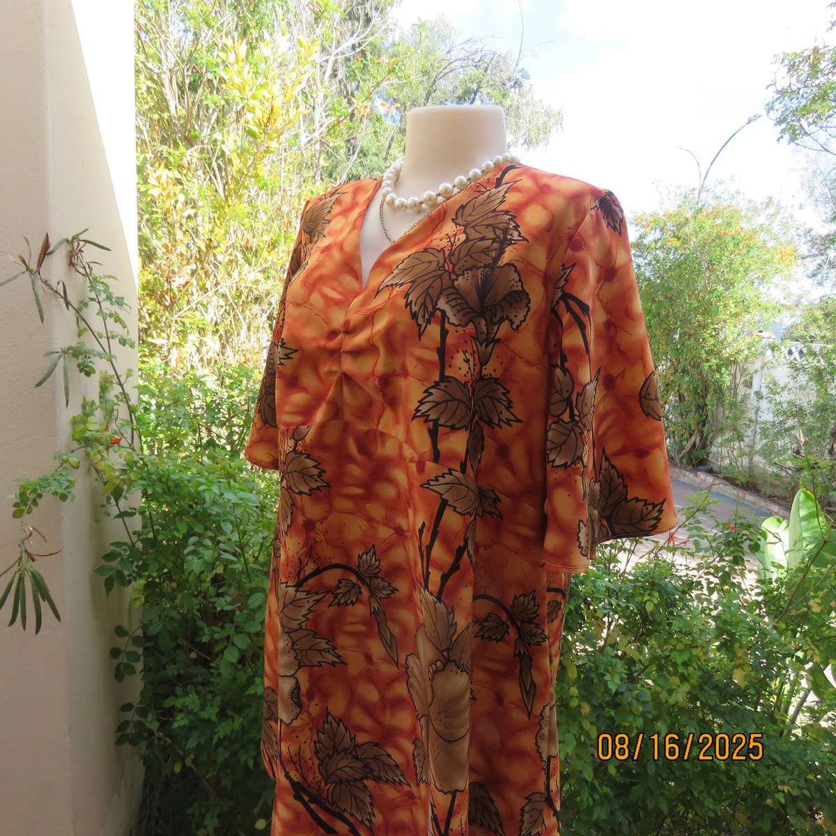 Owner made 2 pc skirt-top outfit in burnt orange and brown. Size 44.