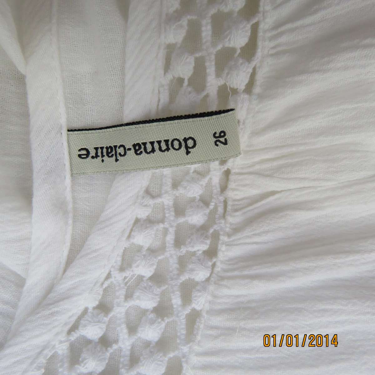 DONNA CLAIRE white creased cotton size 50 button down top. Lace-embroidered yoke.