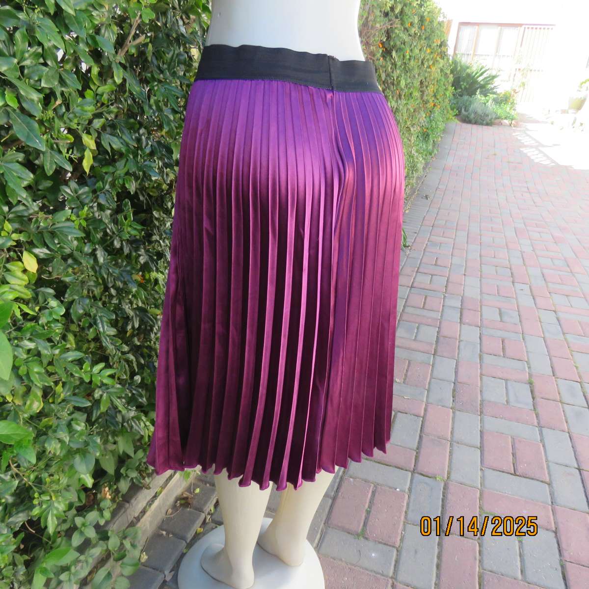 Amazing plum colour silky polyester perm. concertina pleated skirt.Black elastic waistband.Size 36