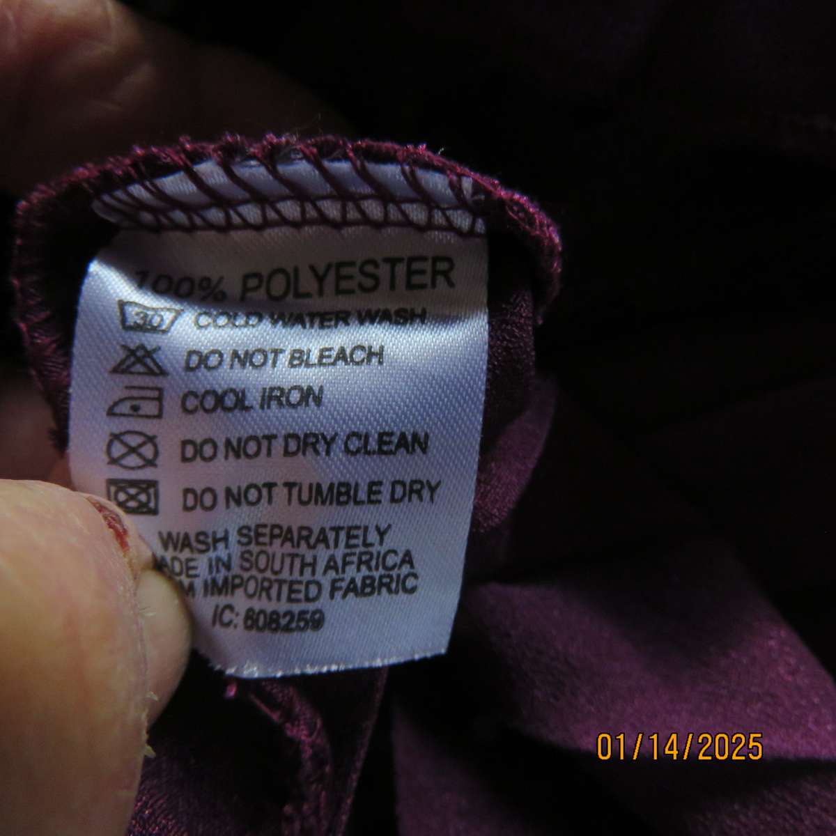 Amazing plum colour silky polyester perm. concertina pleated skirt.Black elastic waistband.Size 36