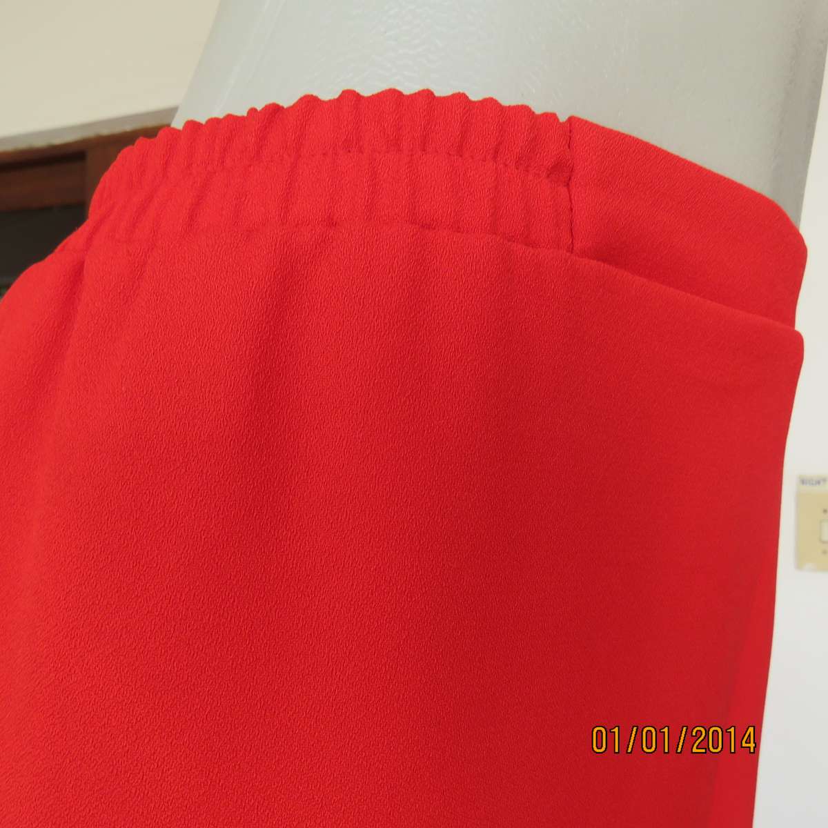 TORI red smart pants with tapering. Flat front. Elasticated sides-back. Size 38