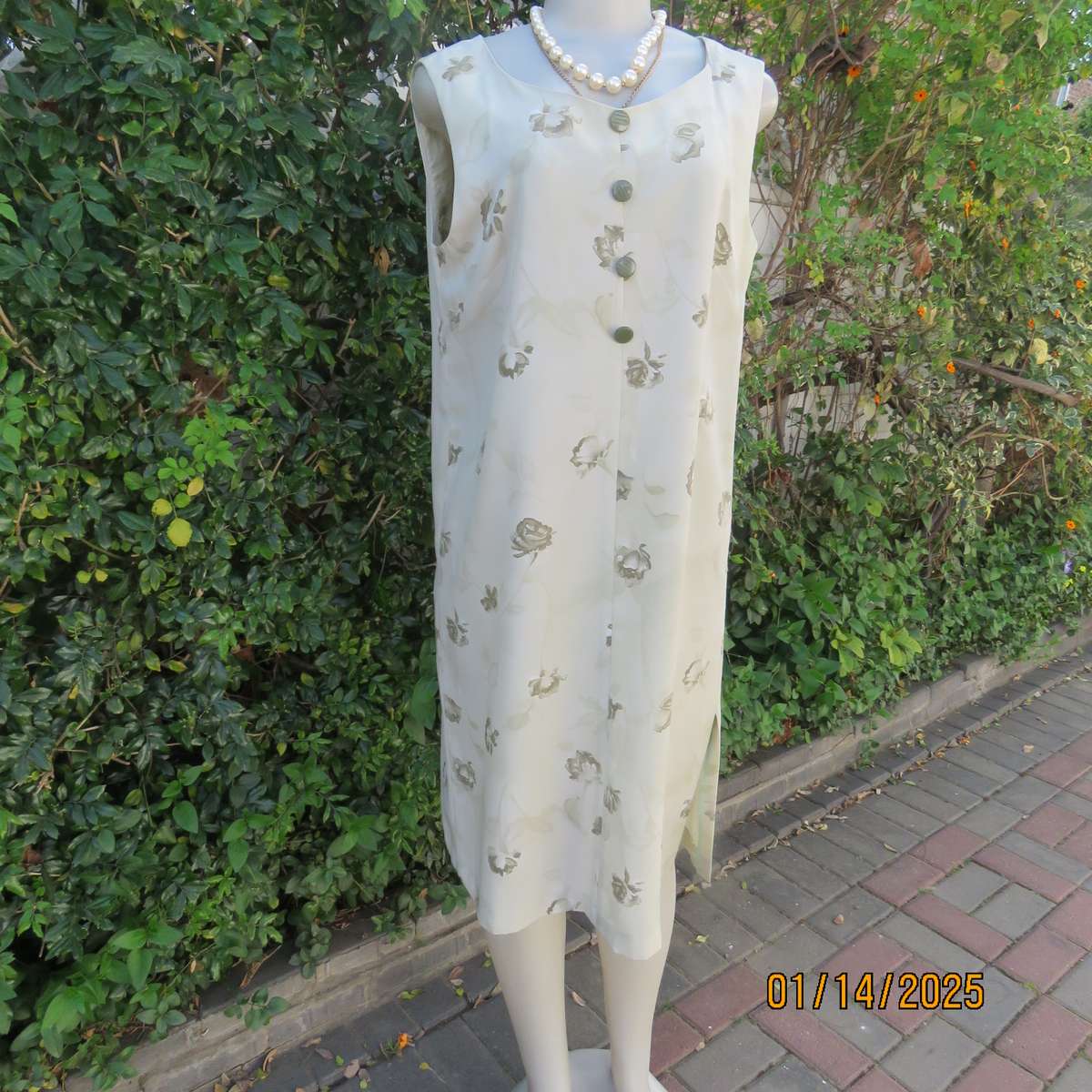Boutique made sage green shift sleeveless dress with olive green flowers, Size 38. Side slit. As new