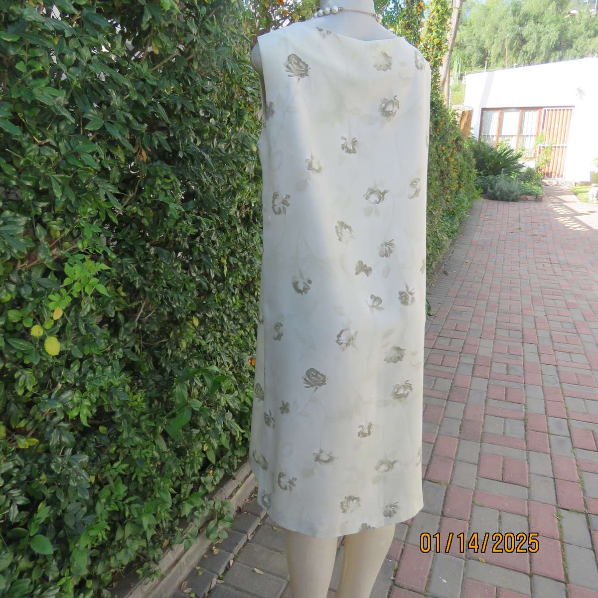 Boutique made sage green shift sleeveless dress with olive green flowers, Size 38. Side slit. As new