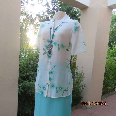 MILADYS white with jade floral print soft polyester button down open collar top. Size 34