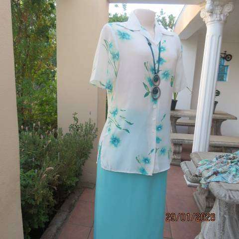 MILADYS white with jade floral print soft polyester button down open collar top. Size 34