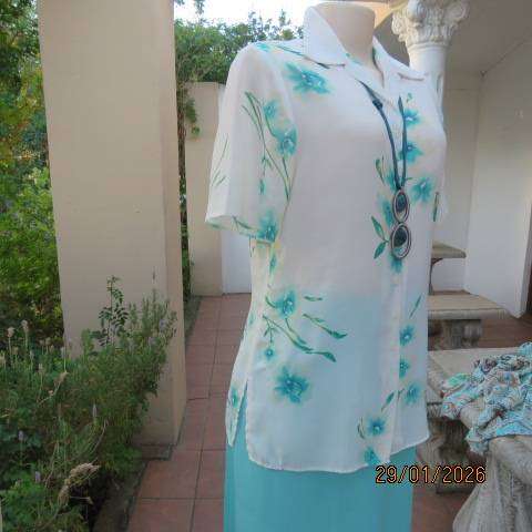MILADYS white with jade floral print soft polyester button down open collar top. Size 34