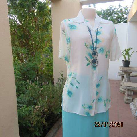 MILADYS white with jade floral print soft polyester button down open collar top. Size 34