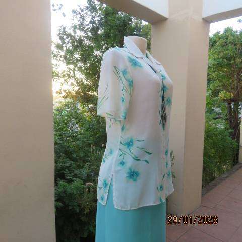 MILADYS white with jade floral print soft polyester button down open collar top. Size 34