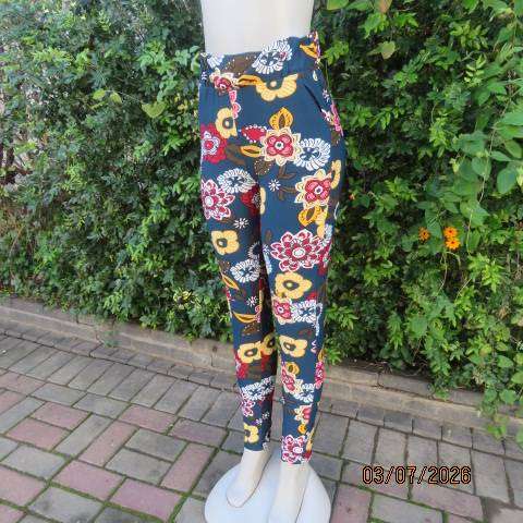 Navy stretch polyester skinny floral pants side pockets and elastic waist, size 34
