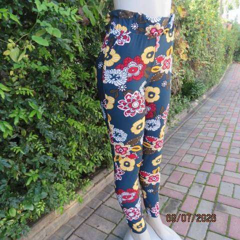 Navy stretch polyester skinny floral pants side pockets and elastic waist, size 34